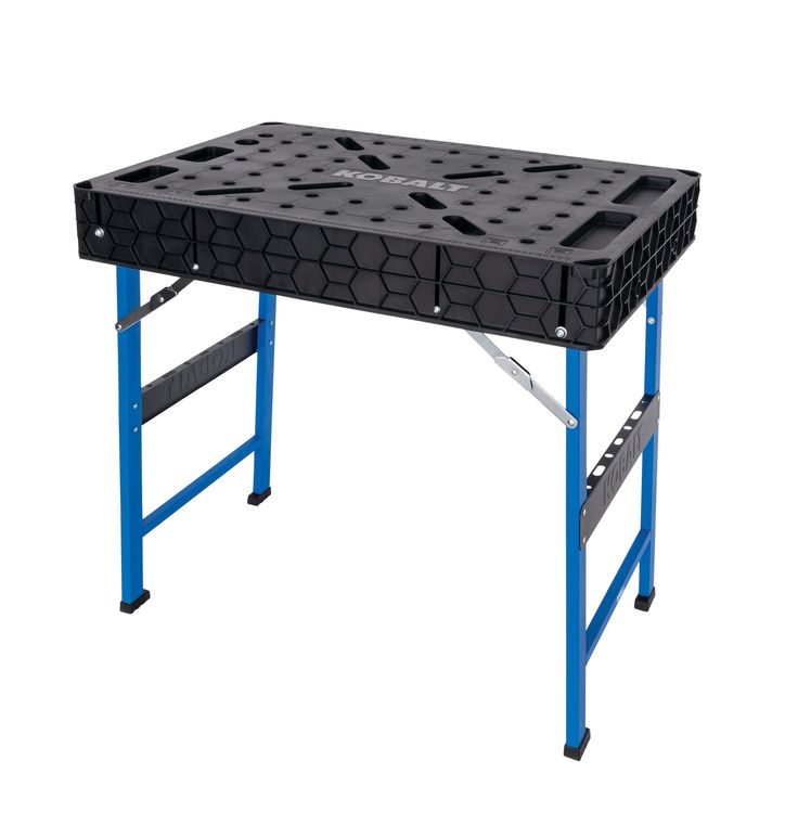 a workbench that is sitting on top of a blue stand with tools underneath it