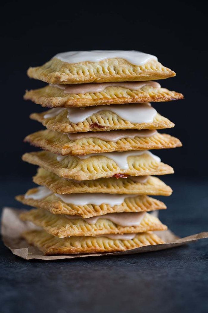 a stack of crackers sitting on top of each other in front of a black background