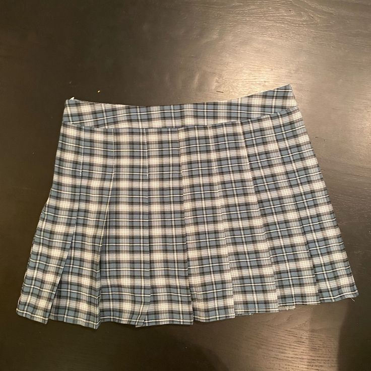 Blue Pleated Plaid Mini Skirt. Size Large. Condition: Brand New Never Been Worn. Tennis Skirt. Blue Mini Length Tennis Skirt For School, Blue Mini Length Skirt For School, Blue Cotton Pleated Skirt For School, Blue Casual Pleated Skirt For School, Blue Pleated Skort For School, Casual Blue Pleated Skirt For School, Preppy Blue Cotton Skirt, Blue School Tennis Skirt, Blue Cotton Mini Skirt For School