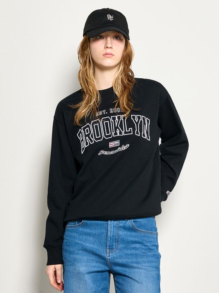 This is a comfortable and casual crewneck sweatshirt that is made out of sturdy cotton and polyester blend fabric. With a minimal yet unique design of graphic print on the front chest and logo emblem embroidered on the left cuff, it gives a casual and trendy look. - Ribbed neckline, cuff, and hem- Graphic print on the front chest- Logo emblem embroidery on the sleeve- Relaxed silhouette Black Crew Neck Sweater With Embroidered Logo, Black Crew Neck Sweatshirt With Embroidered Logo, Black Embroidered Logo Crew Neck Sweatshirt, Oversized T-shirt With Ribbed Cuffs For College, Black Varsity T-shirt For Fall, Oversized Black Sweatshirt With Embroidered Logo, Black Sweater With Embroidered Logo, Relaxed Fit, Oversized Black Sweater With Embroidered Logo, Trendy Long Sleeve T-shirt With Embroidered Logo