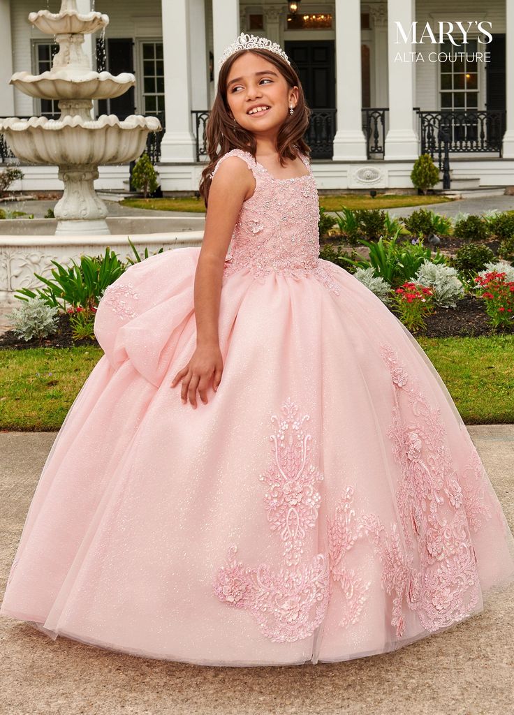 Your sweet girl will feel beautiful in this sleeveless with A-line skirt by Mary's Bridal Mini Quince MQ4036. This dress features a glitter tulle mini quince ball gown with square neck line, beading detail, lace applique, 3D flowers, detachable bow, and back with lace-up closure, tiered bubble skirt, sweep train, and matching bolero jacket is included. This dress matches quinceanera style MQ3092. Mary's Mini Quince Collection: Fall 2022 Style Number: MQ4036 Fabric: Tulle, Glitter Tulle, Applique Bridal Mini, Tulle Applique, Mary's Bridal, 2022 Style, Girls Applique, Dress Idea, Girls Formal Dresses, Sleeveless Gown, Bubble Skirt