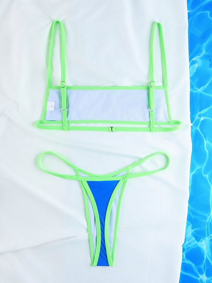 This stylish color block separable bandeau swimsuit for women is the perfect blend of fashion and functionality. Made from high-quality materials, this swimsuit offers both comfort and support, making it ideal for any swim occasion. The unique design allows you to mix and match colors, creating a personalized look that's sure to turn heads. Whether you're lounging by the pool or catching waves at the beach, this swimsuit will keep you looking chic and feeling confident all season longWhether wit Nylon Bandeau Swimwear For Vacation, Nylon Swimwear With Adjustable Straps For Pool, Strapless Green Swimwear For Pool, Strapless Nylon Swimwear For Pool, Nylon Bandeau Swimwear For Beach, Two-tone Swimwear For Poolside Summer, Bandeau Nylon Swimwear For Beach, Two-tone Beachwear Swimwear For Summer, Two-tone Swimwear For Poolside And Summer