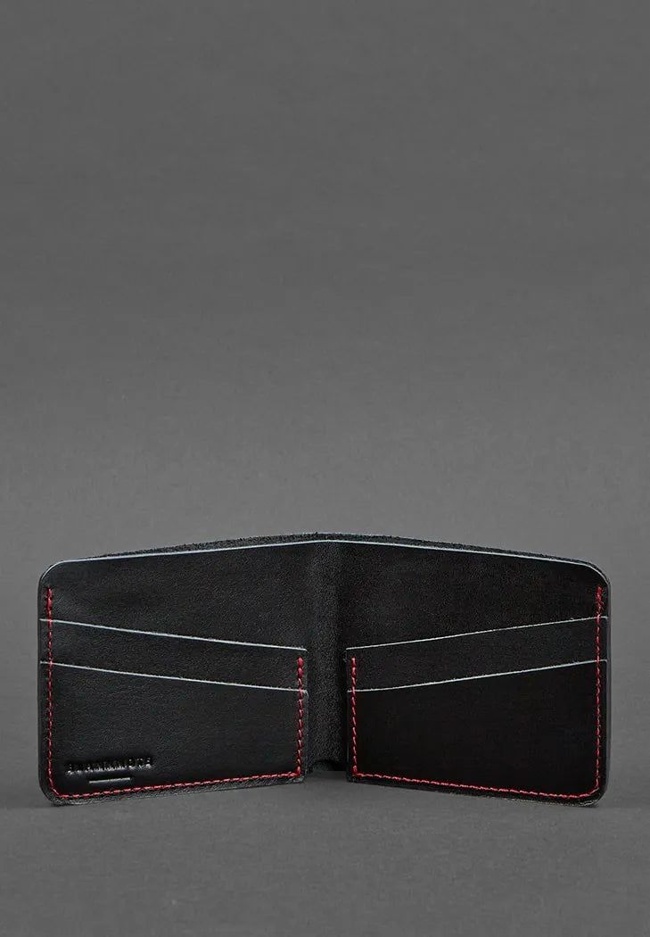 Discover the Designer Compact Men's Leather Wallet, where elegance meets craftsmanship. Made from luxurious genuine leather, this wallet offers a sleek and sophisticated design tailored for the modern man. Its compact form ensures easy carrying without compromising on storage, with multiple card slots and a bill compartment thoughtfully arranged for maximum convenience. The wallet's fine leather finish exudes a timeless charm, making it the perfect blend of practicality and style. Whether for da Black Leather Trifold Card Holder, Black Leather Trifold Wallet For Everyday, Black Bifold Wallet With Interior Card Slots, Black Leather Trifold Wallet For Business, Modern Leather Card Holder For Business, Black Trifold Wallet With Card Slots For Formal Use, Black Leather Wallet With Rfid Blocking, Classic Black Trifold Wallet With Card Slots, Formal Black Trifold Wallet With Interior Card Slots