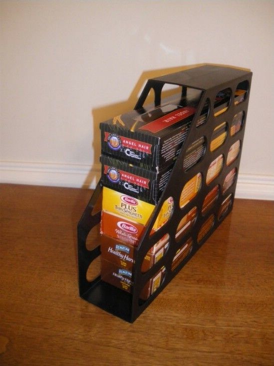 a stack of coffee boxes sitting on top of a wooden floor