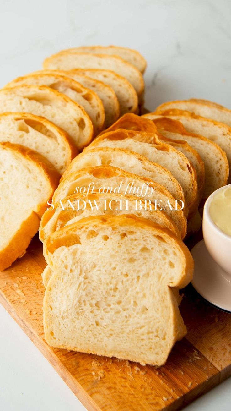 sliced bread and butter on a cutting board