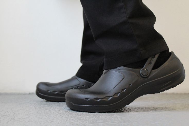 Discover the comfort and slip-resistant safety of our SFC Cloggz™ Collection. Comfortable black slip-resistant clog featuring a durable EVA/rubber upper along with a slip-on design, for easy on and easy off convenience. Water-resistant. Slip-on Workwear Clogs With Protective Feet, Waterproof Closed Toe Clogs For Work, Non-slip Slip-on Clogs For Work, Durable Black Round Toe Clogs, Functional Slip-resistant Clogs With Round Toe, Functional Slip-resistant Round Toe Clogs, Durable Slip-on Clogs For Workwear, Slip-resistant Closed Toe Clogs For Workwear, Black Waterproof Functional Clogs