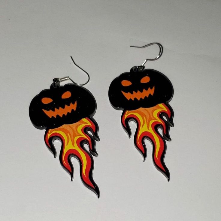 These Fun Earrings Are Handmade And Brand New. 2" Long On A Pierced Ear Wire, You Can Wear These As Part Of A Costume Or Every Day Wear. They Are Jack-O-Lanterns With Black Sparkly Heads And Flames Coming Out The Bottom. They Are A Light Weight Plastic That Will Last For Years To Come. Black Spooky Jewelry For Costume Party, Black Novelty Jewelry For Costume Party, Spooky Handmade Earrings For Halloween, Spooky Black Jewelry For Halloween, Handmade Witchy Earrings For Halloween, Handmade Spooky Halloween Earrings, Spooky Handmade Halloween Earrings, Spooky Black Halloween Jewelry, Handmade Spooky Black Earrings