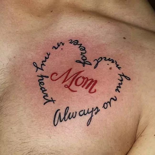 a man with a heart tattoo on his chest that says mom always on the chest