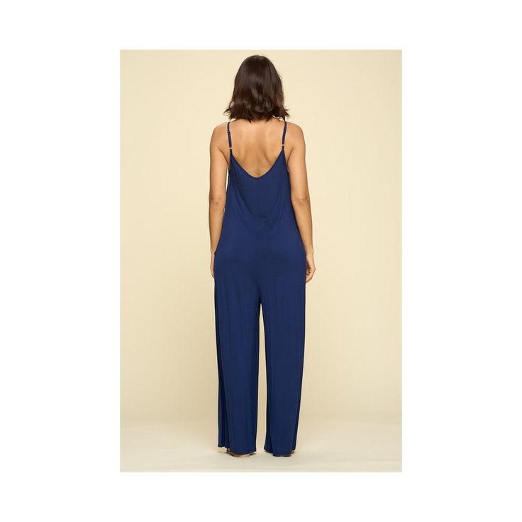 This is the perfect throw-on jumpsuit, no matter the occasion. It's composed of a soft knit fabric, making it comfy enough to lounge all day in (which we highly recommend) but it also doubles as your complete night-out attire - just add a belt and throw on some strappy heels! We love a good versatile go-to piece. Made in USA Solid Color V-neck Jumpsuits And Rompers For Leisure, Solid Color V-neck Jumpsuit For Loungewear, Relaxed Fit Overalls Jumpsuit For Loungewear, Relaxed Fit Overalls For Loungewear, Relaxed Fit Jumpsuits And Rompers For Loungewear, Solid Color Loungewear Overall Jumpsuits And Rompers, Solid Color Loungewear Overall Jumpsuit, Solid Color Overall Jumpsuits For Loungewear, Comfortable Leisure Overalls And Rompers