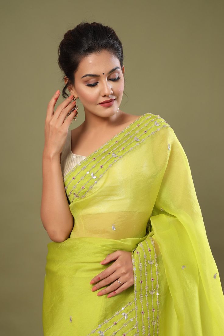 Beautiful pista green organza saree with embroidered border is a perfect drape for festive occasions! It comes with a matching blouse piece. Disclaimer: The actual product may vary slightly from the image. These are custom orders, hence expect slight variation in color, placement of the motif or buta. ESTIMATED DELIVERYBecause this is a custom order, it would take about 4 weeks from the date of purchase. RETURN POLICYThis product is a custom order and cannot be returned or exchanged. Green Organza Saree, Organza Sari, Pista Green, Wedding Sarees, Embroidered Border, Organza Saree, Designer Sarees, Handloom Saree, Saree Wedding