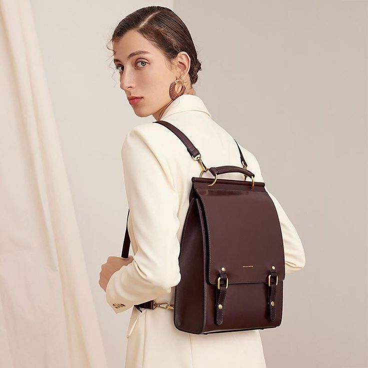 Discover the Ultimate Fusion of Style and Functionality Introducing our latest collection's star, the Vintage Leather Backpack for Women – your perfect companion for school, travel, and everyday adventures. Designed to cater to the dynamic lifestyle of modern women, this backpack is not just a bag, but a statement of elegance and practicality. Exceptional Quality and Design Crafted with meticulous attention to detail, this backpack features high-quality split cow leather combined with durable mi Luxury Chic Kate Spade Leather Backpack, Elegant Large Capacity Backpack For On-the-go, Large Capacity Laptop Backpack For On-the-go, Luxury Large Capacity Shoulder Backpack, Luxury Large Capacity Backpack For Daily Use, Large Capacity Leather Shoulder Backpack For On-the-go, Large Capacity Laptop Backpack For Travel, Classic Large Capacity Travel Backpack, Trendy Laptop Backpack With Adjustable Strap