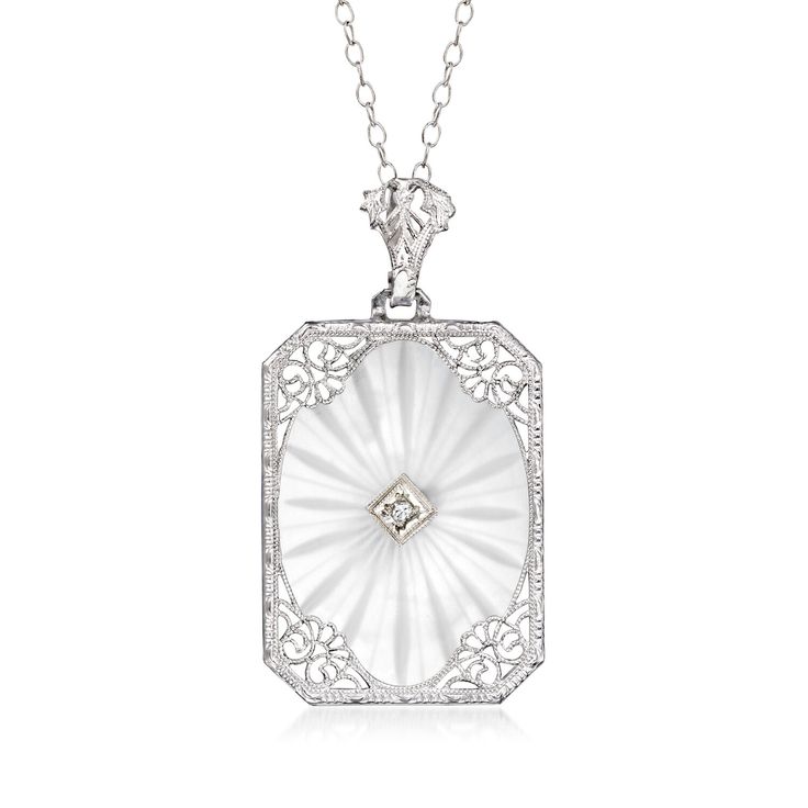 Ross-Simons - C. 1950 Vintage 8.50ct Rock Crystal Filigree Pendant Necklace, Diamond Accent. 16.5". C. 1950. Presented by our Estate collection, this alluring Retro-era pendant necklace will enhance the elegance of any formal ensemble. A translucent 8.50 carat rectangular rock crystal acts as the backdrop to fanciful filigree detailing and a sparkling diamond accent. Crafted in 14kt white gold. Suspends from a cable chain. Springring clasp, rock crystal filigree pendant necklace. Exclusive, one- Antique White Gold Necklace With Diamond Accents, Antique Round Necklace With Diamond Accents, Art Deco White Gold Oval Necklace, Antique White Gold Filigree Necklace, Vintage White Gold Necklace With Diamond Accents, Antique White Gold Necklace With Filigree, Art Deco Oval Diamond Necklaces, Vintage Diamond White Necklace With Diamond Cut, Vintage Diamond Cut Necklace In Diamond White