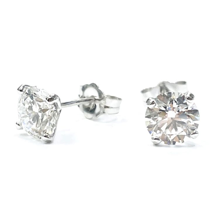 Beautiful diamond Earrings perfect for engagements Present, anniversaries, Holidays or statement jewelry. Lab Grown Diamond Earrings, 2.02 Carat Round Cut E VVS2 14k White Gold STU Stone Lab Grown Diamond Grading Results Shape: Round Cut Carat Weight 2 Stones/ 2.02 Carat Color Grade E Clarity Grade VVS2 Total 2.02 Ct  Earring 14K White Gold All products come with a Certificate. They certify all aspects of the ring, not just the diamond. We also provide an appraisal. Please feel free to contact m Gia Certified Lab Grown Diamond Earrings For Gift, Fine Jewelry Bridal Earrings With Round Cut For Anniversary, Gia Certified Lab Grown Diamond Earrings As Gift, Gia Certified Diamond Bridal Earrings, Classic Bridal Earrings With Prong Setting, Classic Round Bridal Earrings In Diamond White, Classic Round Diamond White Bridal Earrings, Classic Diamond White Round Bridal Earrings, Formal Round Bridal Earrings With Vvs Clarity