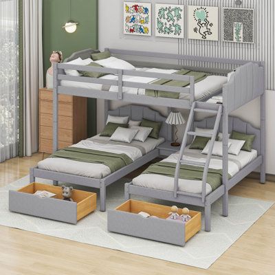 a bunk bed with two sets of drawers underneath it in a child's room