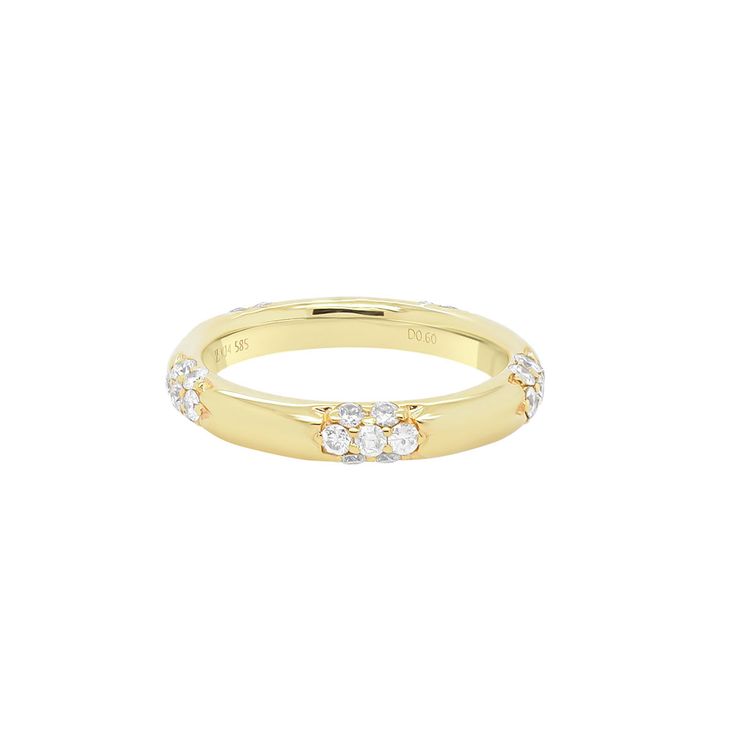 a yellow gold ring with three diamonds on the outside and inside, set against a white background