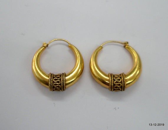 ethnic sterling silver gold vermeil gold gilded earring pair from rajasthan india. nice handmade design good for jewelry collection.size - 3.2 cm(1.26")weight - 12.5 gramsmaterial - Good Silver with gold plate. Antique Gold Earrings For Festivals, Festival Gold Brass Chandbalis, Traditional Gold Chandbalis In Brass, Brass Hoop Earrings With Latkans For Festivals, Brass Temple Jewelry Hoop Earrings For Festivals, Gold Metal Chandbalis Temple Jewelry, Gold Metal Chandbalis In Temple Jewelry Style, Handmade Brass Chandbalis For Festivals, Brass Chandbali Hoop Earrings With Latkans