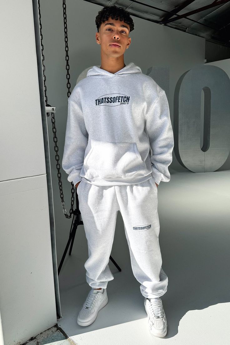 Introducing the hottest new lounge - the Series 10 Hoodie is the must have style of the season! Enjoy the ultra soft fleecy material and exclusive ThatsSoFetch logo, complete with a front pocket for extra convenience. For a truly stylish look, pair it with matching sweatpants and tee. Look luxurious and feel comfortable! FABRICATION: 60% Cotton / 40% Polyester SIZING: Crystal's height is 162cm/5'3 and wears a size XS. Fleece Tracksuit With Kangaroo Pocket, Athleisure Fall Tracksuit With Kangaroo Pocket, Fall Athleisure Tracksuit With Kangaroo Pocket, Fleece Tracksuit With Kangaroo Pocket In Athleisure Style, Basic Hoodie With Kangaroo Pocket For Loungewear, Winter Sportswear Sweats With Side Pockets, Sporty Tracksuit With Hoodie And Pockets, Winter Tracksuit With Side Pockets For Loungewear, Winter Athleisure Sweats With Pockets