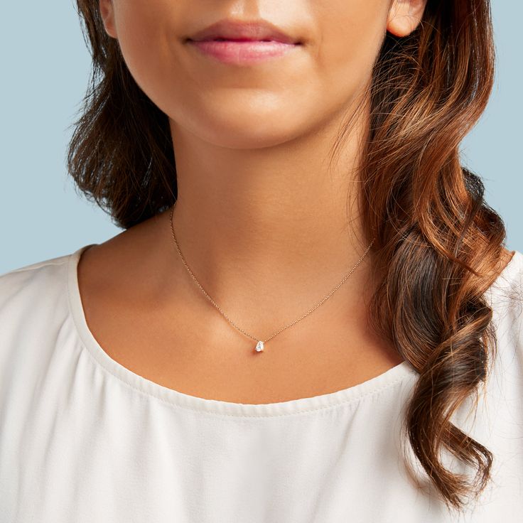 This classic style pear shaped pendant is a timeless addition to any jewelry collection and can be worn on its own or layered! Classic Diamond Pear-shaped Necklace, Timeless Pear-shaped Diamond Necklace For Anniversary, Timeless Pear-shaped Diamond White Jewelry, Elegant Pear-shaped Diamond White Necklace, Timeless Pear-shaped White Gold Jewelry, Dainty Teardrop Necklace With Single Diamond, White Pear-shaped Diamond Cut Necklace, Pear-shaped White Diamond Necklace, Pear-shaped White Diamond Cut Necklace