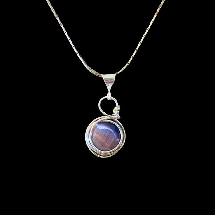 ✧ high end wire-wrap jewelry ✦ one-of-a-kind guaranteed ✧ hand-crafted with love ✦ D E T A I L S: » Solid .925 Sterling Silver Pendant. » Purple Cats Eye Cabochon. » 18in Snake Chain 1.2mm with Lobster Clasp, .925 Sterling Silver PLATED. S H I P P I N G: » Orders will be ready to ship out in 1-3 days. » Standard USPS First Class Delivery. » US Domestic Shipping Only. » Tracking Number will be automatically sent to you when shipped. » If you would like a Signature Confirmation upon delivery, plea Unique Hand Wrapped Sterling Silver Jewelry, Unique Wire Wrapped Round Jewelry, Handmade Silver Plated Round Pendant, Handmade Silver Plated Round Pendant Jewelry, Sterling Silver Wire Wrapped Round Pendant, Sterling Silver Wire Wrapped Round Pendant Jewelry, Nickel-free Round Silver Plated Wire Jewelry, Handmade Silver Plated Wire Round Pendant Jewelry, Hand Wrapped Round Jewelry For Anniversary