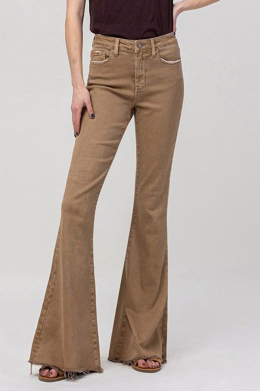 Elevate your fashion game with our High Rise Super Flare Jeans. These comfortable and flexible color denim jeans feature a high rise waist for a flattering fit, making a bold fashion statement in a full-length design. The super flare style adds a touch of retro charm and drama to your ensemble, ensuring you stand out in style.Model is 5' 10.5" wearing size 26 Style: Retro Print / Pattern: Color Denim Silhouette: Super Flare Jean Fit: Relaxed Embellishment: High Rise Waist Neck Line: NA Sleeve: N Super Flare Jeans, Jean Fit, China Style, Stylish Jeans, Flying Monkey Jeans, Retro Print, Denim Design, Sweater Sale, Sheer Fabric