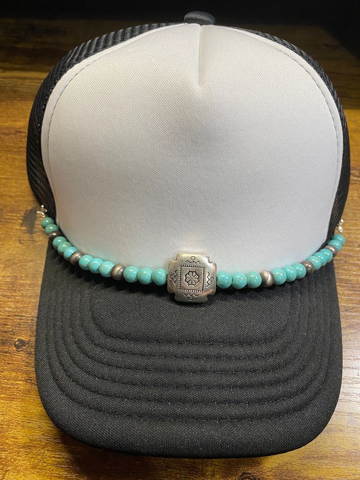 Beaded trucker hat chain approximately 10" long with silver lobster clasps to attach to mesh of trucker hat turquoise & cream magnesite bead. Hat Chain Only. HAT NOT INCLUDED Southwestern Jewelry With Adjustable Chain, Western Jewelry With Adjustable Chain, Southwestern Style Jewelry With Adjustable Chain, Western Style Jewelry With Adjustable Chain, Adjustable Southwestern Jewelry With Silver Beads, Adjustable Southwestern Silver Beaded Jewelry, Western Style Adjustable Beaded Jewelry, Adjustable Turquoise Jewelry With Adjustable Chain, Adjustable Silver Turquoise Necklace With Silver Beads