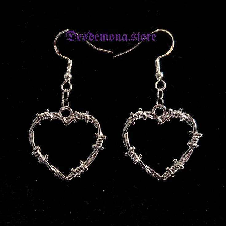 3D all around detailed barbed wire effect hearts. Smooth and rounded - not actually sharp or spikey and really light-weight 😊)  Size of charm is 2.2 cm x 2.2 cm (approx.) Full drop length with hook is just under 5cm Made of corrosion and tarnish resistant zinc alloy. Earring hook is zinc alloy based and 925 Sterling silver plated. *Stainless Steel Closed Hinged Earring Hooks available upon request!* Silver Gothic Earrings For Valentine's Day, Silver Grunge Jewelry For Party, Silver Heart-shaped Punk Jewelry, Edgy Handmade Silver Earrings, Gothic Heart-shaped Pierced Jewelry, Emo Dangle Metal Jewelry, Silver Punk Hoop Earrings For Party, Edgy Silver Earrings With Ear Wire, Emo Style Metal Dangle Jewelry