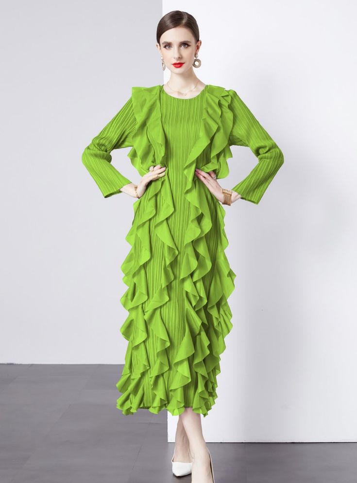 Emanate a vibrant energy in this striking green ruffle dress, a bold statement piece designed for the fearless fashion enthusiast. With its electrifying hue, this dress is a wearable expression of confidence and individuality. The unique pleated texture, combined with the cascading ruffles from the waist down, creates a sense of dynamic movement, echoing the rhythm of the wearer's stride. The elongated cuffs and structured shoulders craft a silhouette that's both modern and timeless. It's an ide Dark Green Ruffled Dress For Party, Dark Green Elegant Ruffle Dress, Elegant Dark Green Ruffled Dress, Elegant Dark Green Dress With Ruffles, Dark Green Evening Dress For Spring, Dark Green Midi Dress For Spring Party, Dark Green Spring Party Midi Dress, Chic Dark Green Midi Dress For Spring, Green Ruffled Midi Dress For Party