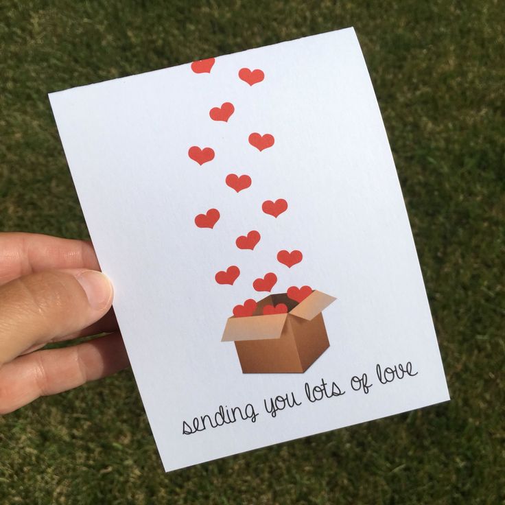 someone is holding up a card with hearts coming out of it that says, sending you let go of love