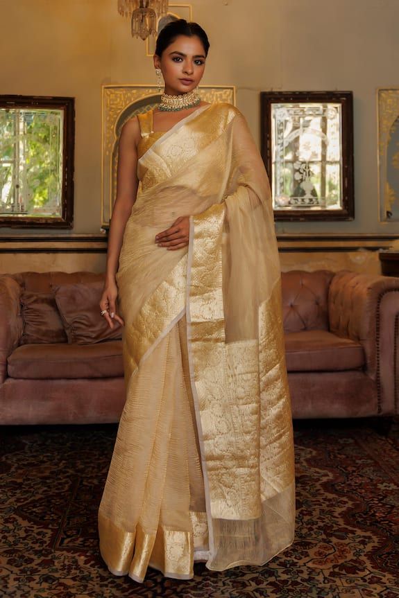 Light gold saree with zari floral vine woven motifs. Comes with unstitched blouse piece. - Aza Fashions Formal Anarkali Chanderi Pre-draped Saree, Anarkali Style Chanderi Pre-draped Saree For Formal Occasions, Chanderi Pre-draped Saree With Zari Work For Formal Events, Art Silk Saree With Self Design For Reception, Anarkali Tissue Silk Saree For Formal Occasions, Formal Anarkali Tissue Silk Saree, Formal Tissue Silk Traditional Wear With Dupatta, Formal Festive Chanderi Pre-draped Saree, Formal Fitted Pre-draped Chanderi Saree