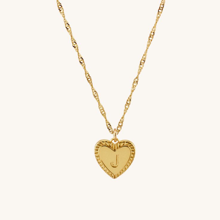 Elevate your everyday style with our stunning Personalized Heart Charm Necklace. Made from tarnish-resistant gold-filled material, this delicate piece features a charming initial letter heart, making it the perfect addition to your jewelry collection. Customizable with your initial or a loved one’s, it’s an ideal gift for birthdays, anniversaries, or just because! • Single Necklace• Gold Filled• Satellite Chain Length: 17" + 1" extender• Cable Chain Length: 18" + 1" extender• Twist Chain Length: Heart Initial Necklace, Single Necklace, Heart Charm Necklace, Steel Gifts, Initial Letter, Initial Charm, Gold Heart, Heart Of Gold, Just Because