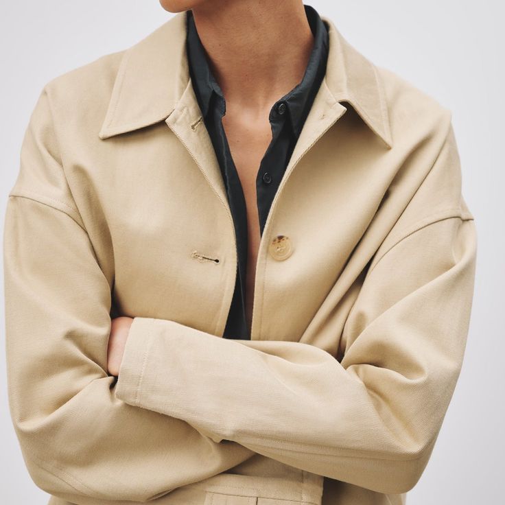 Buttons up the front, dropped shoulders and a collar Fabric: 71% cotton, 29% linen Total length: 37" Sleeve from center back: 32" Bust: 50" (size M) Loose, oversized fit. We suggest going down a size. 12588-W1266 Chic Outerwear With Buttons And Relaxed Fit, Chic Relaxed-fit Outerwear With Buttons, Chic Relaxed Fit Outerwear With Buttons, Classic Oversized Single-breasted Utility Jacket, Classic Outerwear With Spread Collar For Everyday, Chic Oversized Cotton Outerwear, Classic Utility Jacket With Relaxed Fit For Workwear, Relaxed Fit Single-breasted Workwear Outerwear, Single-breasted Relaxed Fit Outerwear For Work