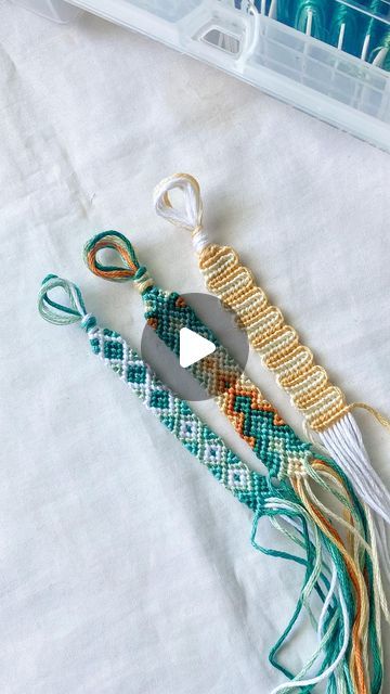 a video demonstrating how to make bead tassels with beads and thread on a table