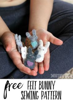 a child's hands holding some felt bunny sewing patterns with text overlay that says free felt bunny sewing pattern