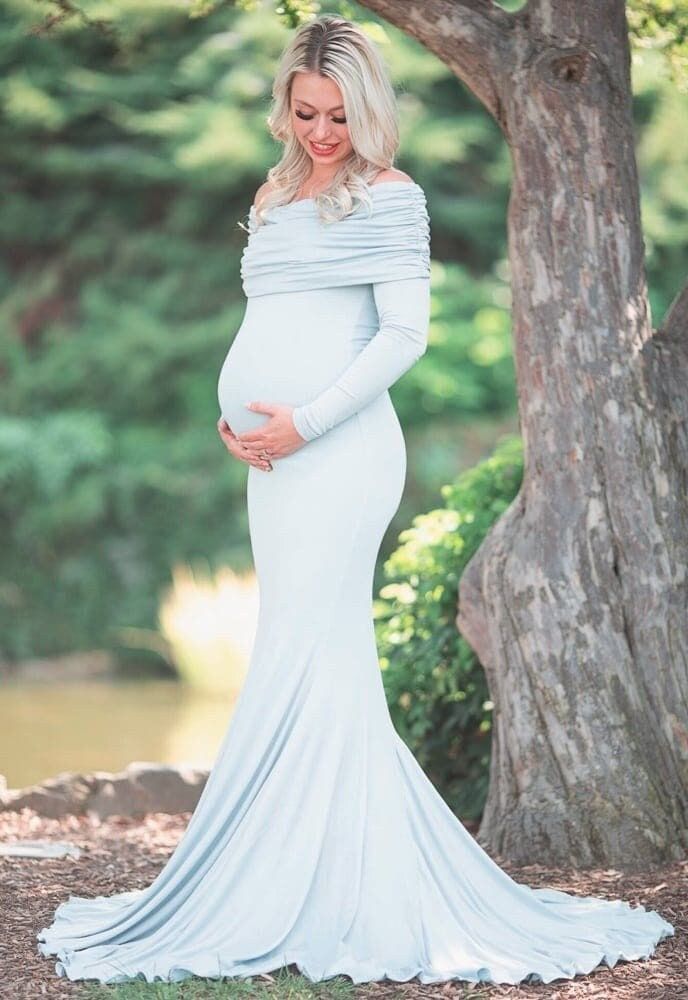 "Our Ruched Fold Over Flare Gown is the perfect photoshoot or special event maternity gown! With a slim fit bodice, a simple flare, and a premium stretch material this gown is equal parts comfort as well as elegance. This formal maternity dress is sure to wow!   Gown Length: Standard 50\" under bust to floor, adjusted free of charge. Gowns are designed and made in our female-run gown shop in Boise, Idaho. Purchase with confidence from the top U.S. maternity gown manufacturer for six years straig