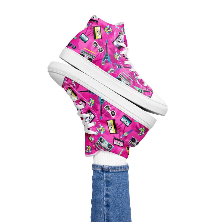 These retro-inspired pink 80s sneakers are a blast from the past! With a bold and bright color, these shoes are sure to bring back the nostalgia of the 80s. Whether you're going out on the town, or just want to add a fun splash of color to your wardrobe, these shoes are perfect! Get your pair today and make a statement! D E T A I L S * 100% polyester canvas upper side * Ethylene-vinyl acetate (EVA) rubber outsole * Faux leather toe cap * Removable insole * White laces * Padded collar, lace-up fr Retro High-top Sneakers For Spring Streetwear, Retro High-top Custom Sneakers, Retro Pink Sneakers For Skateboarding, Retro Pink Low-top Skate Shoes, Trendy Pink High-top Custom Sneakers, Pink Lace-up High-top Sneakers For Skateboarding, Pink High-top Skate Shoes For Skateboarding, Trendy Pink Skate Shoes For Skateboarding, Pink High-top Sneakers For Skateboarding