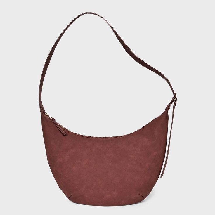 Bring a chic finishing touch to your everyday or dressy outfits with this Slouchy Crescent Sling Handbag from Universal Thread™. This unstructured handbag features a single zipper compartment to carry your phone, wallet, makeup essentials and other items. Plus, it has an interior zip pocket for any additional space you need. Designed in crescent shape and featuring a faux-suede finish in a solid hue, this handbag features an adjustable belt strap that make carrying it convenient and comfortable. Chic Hobo Bag With Cell Phone Pocket For Travel, Versatile Hobo Shoulder Bag With Cell Phone Pocket, Versatile Hobo Bag With Cell Phone Pocket, Elegant Everyday Hobo Bag With Cell Phone Pocket, Chic Everyday Hobo Bag With Cell Phone Pocket, Chic Hobo Bag With Cell Phone Pocket, Hobo Bag With Cell Phone Pocket For On-the-go, Elegant Hobo Bag With Cell Phone Pocket, Modern Bag With Cell Phone Pocket