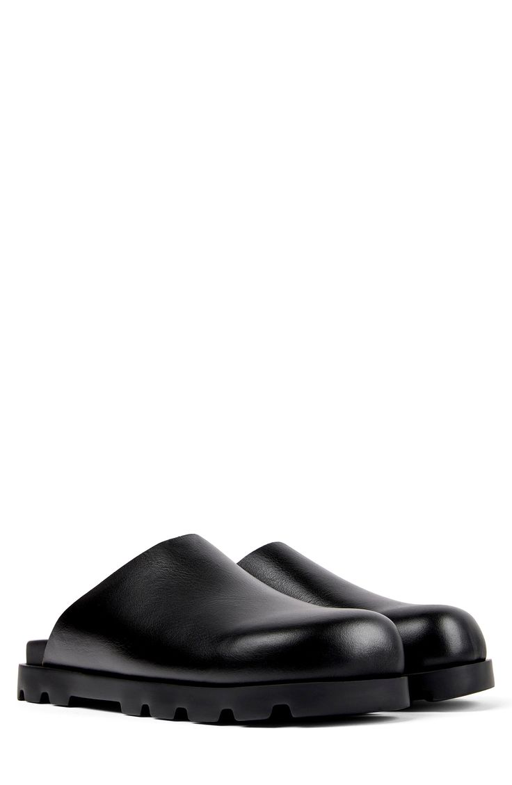 A surprisingly lightweight sole brings everyday comfort to this minimalist mule crafted from smooth leather. Cushioned footbed Leather upper and lining/synthetic sole Imported Mens Mules, Half Shoes, Zara Sandals, Zara Men, Leather Slippers, Zara Man, Mens Sandals, Smooth Leather, Trending Shoes