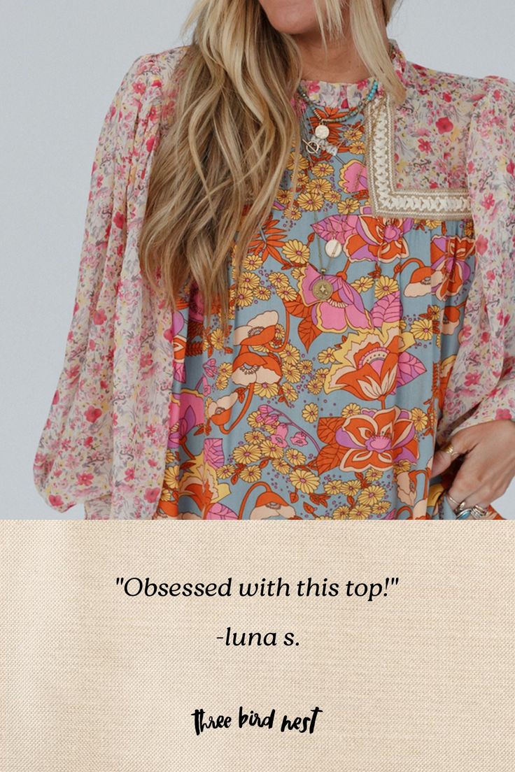 Blossom into every season in our Flower Frenzy Bubble Sleeve Top adorned with a vibrant floral print, creating a whimsical boho and romantic vibe! Perfect for casual and dressier occasions, you'l love this versatile wardrobe essential because it features: Lightweight, flowy chiffon fabric with eye - catching contrasting floral fabrics throughout Relaxed and loose blouse silhouette Classic round neckline with so cute ruffle detail and back key - hole closure So cute embroidered details along the Spring Floral Dress With Boho Print For Garden Party, Spring Multicolor Boho Floral Dress, Flowy Ditsy Floral Print Dress For Daywear, Flowy Free-spirited Spring Dress, Ditsy Floral Print Bohemian Vacation Dress, Ditsy Floral Print Bohemian Dress For Vacation, Flowy Ditsy Floral Dress For Daywear, Spring Free-spirited Flowy Dresses, Bohemian Ditsy Floral Dress For Vacation