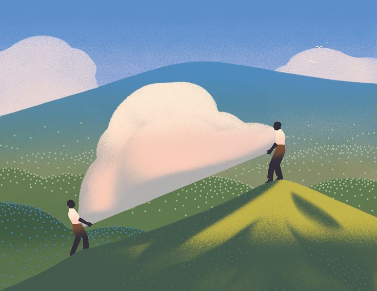 two people standing on top of a hill with a large cloud in the sky above them