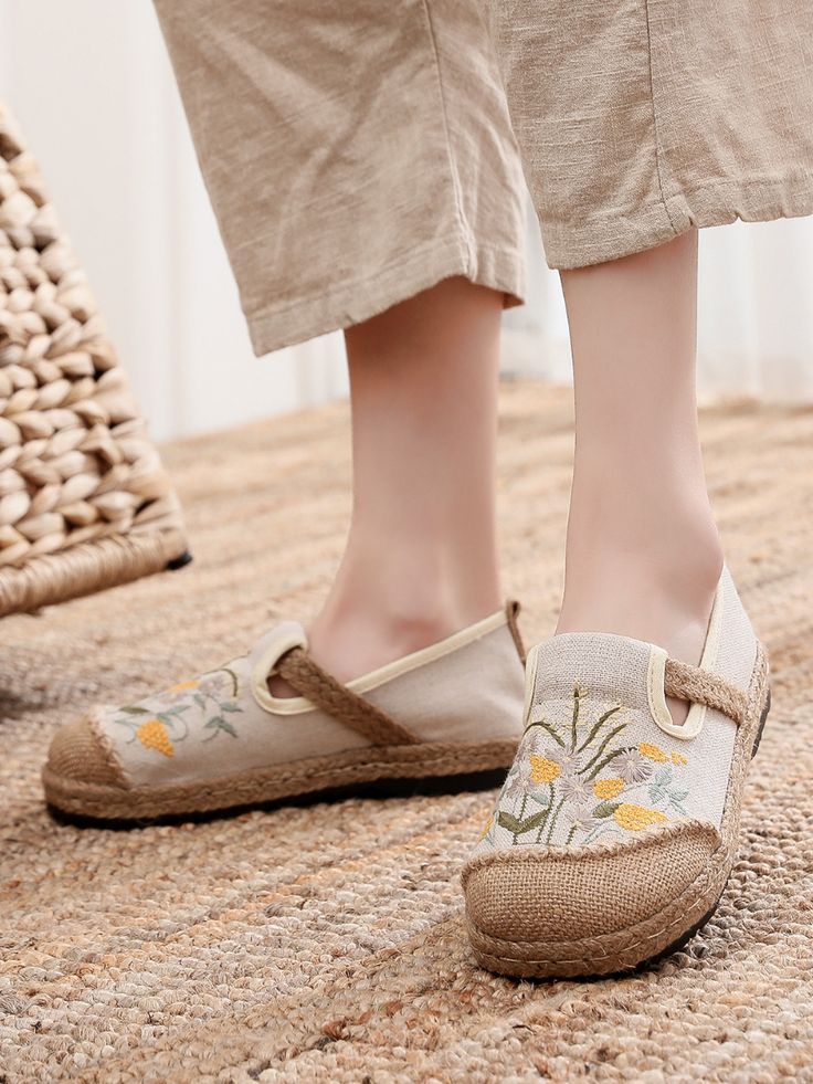 Radiate beachy vibes with every step wearing this slip-on espadrille that showcases a stripe motif and cross-strap. A rubber sole keeps your footing sure as you navigate slippery terrain. Slip-on Canvas linen upper Man-made lining Natural straw mat breathable insole Rubber sole Comfortable Slip-on Espadrilles For Summer, Summer Beach Slip-on Flats, Beige Round Toe Flats For Spring, Closed Toe Flats For Spring Vacation, Spring Vacation Closed Toe Flats, Beige Flats With Woven Sole For Spring, Summer Slip-on Flats With Woven Sole, Summer Slip-on Flats With Round Toe, Beige Round Toe Flats For Summer