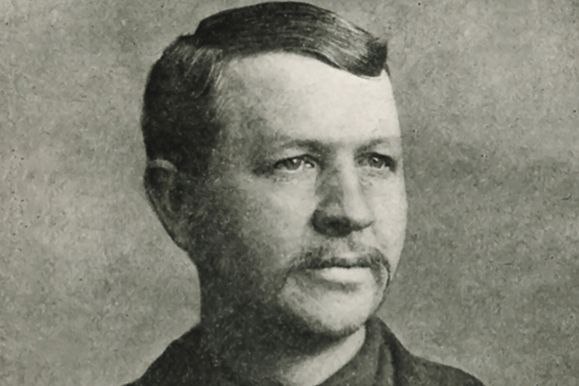 an old black and white photo of a man with a mustache in front of a sign that says professor o'really