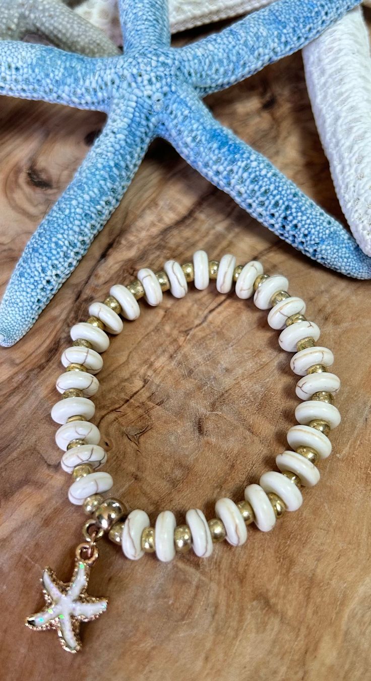 Materials:  Blue and white howlite, glass, crystals and white quartz chips beads.  This products are not intended for children under 12 years old. Please bear in mind that photo may slightly be different from actual item in terms of color due to the lighting. White Hand-strung Bracelets For Beach, Adjustable White Pearl Bracelet For Beach, White Hand-strung Beaded Bracelets For Beach, White Hand-strung Beaded Bracelet For Beach, Handmade White Pearl Bracelet For The Beach, Bohemian Gemstone Beads Bracelets For Beach, Bohemian Gemstone Beads Bracelet For Beach, White Hand-strung Bracelets For Vacation, Hand-strung White Bracelets For Vacation