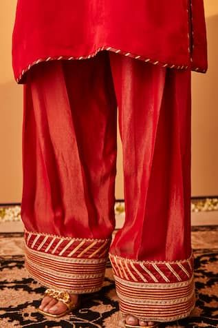 Red kurta with gota embroidery on yoke. Paired with pakistani salwar and dupatta. - Aza Fashions Traditional Red Sets With Gota Work, Embroidered Border Sharara For Traditional Ceremonies, Red Raw Silk Sets With Gota Work, Red Silk Traditional Wear With Gota Work, Ceremonial Red Kurta With Dabka Work, Red Embroidered Palazzo Set For Transitional Season, Embroidered Red Palazzo Set For Transitional Season, Red Embroidered Sets For Festivals, Red Dori Work Kurta For Traditional Ceremonies