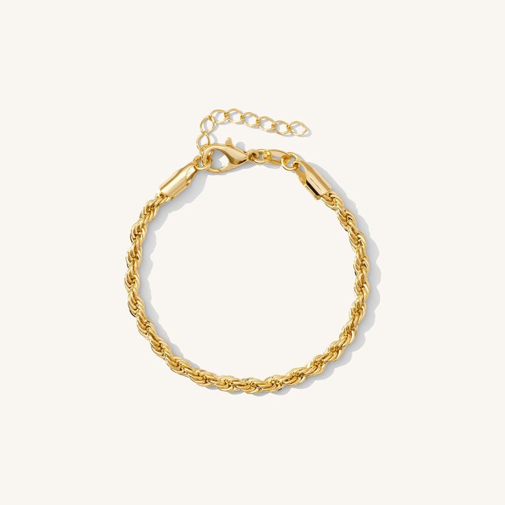 The bracelet we’d wear on a summer trip to Rio. This shimmery rope chain is sturdy and luxe. You loved the necklace so much, this best selling piece is now available as a bracelet. Texture + sparkle all wrapped into one bracelet. 18k Gold plated stainless steel Psst: This piece utilizes durable stainless steel that's tarnish/water resistant - feel free to wear it 24/7! Thickness: 3 mm Length: 6” + 1” extender Gold Rope Chain Bracelet, Adjustable Gold Rope Chain Bracelet, Minimalist Rope Chain Bracelet For Everyday, Minimalist Rope Chain Bracelets For Everyday, Minimalist Rope Chain Bracelets, Everyday Gold Rope Chain Bracelet, Adjustable Rope Chain Bracelet As Gift, Adjustable Rope Chain Bracelet For Gift, Everyday Rope Chain Bracelet