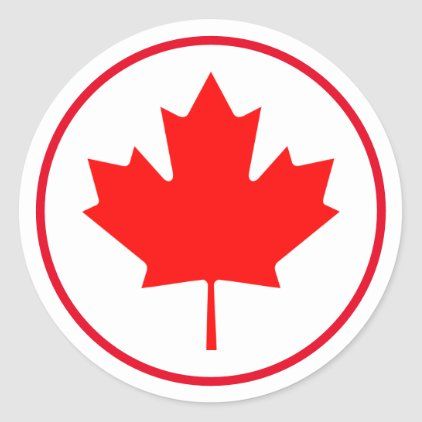 a red and white sticker with the canadian maple leaf in it's center