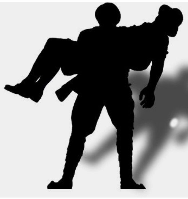 the shadow of a man carrying a woman on his back, and an object in the background