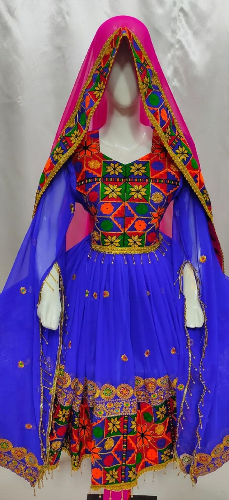 afghan kuchi traditional wedding drees  is made of good quality long lasting fabric. Traditionally such Afghanistan Persian Pashtun new design frocks are used as bridal dress. Most of girls also like and recommend such dresses for wedding, Nikkah and Mehndi night events. The dress measurements are kept average. If you need this frock in exact measurements you need, then please  send us measurements which best fit on your body Floor-length Dupatta With Mirror Work For Traditional Ceremonies, Floor-length Mirror Work Dupatta For Traditional Ceremonies, Traditional Gown With Multicolor Embroidery And Dupatta, Anarkali Gown With Mirror Work For Traditional Ceremonies, Bohemian Handwork Traditional Wear For Wedding, Bohemian Traditional Wear With Handwork For Wedding, Semi-stitched Embroidered Festival Dress, Traditional Gown With Mirror Work For Festivals, Mirror Work Gown For Eid