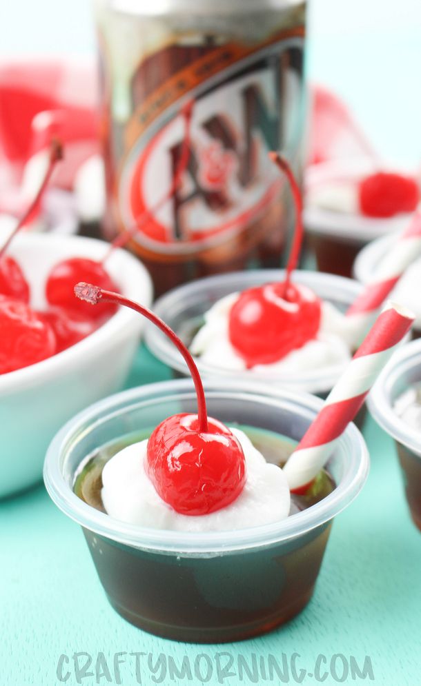 small cups filled with ice cream and cherries