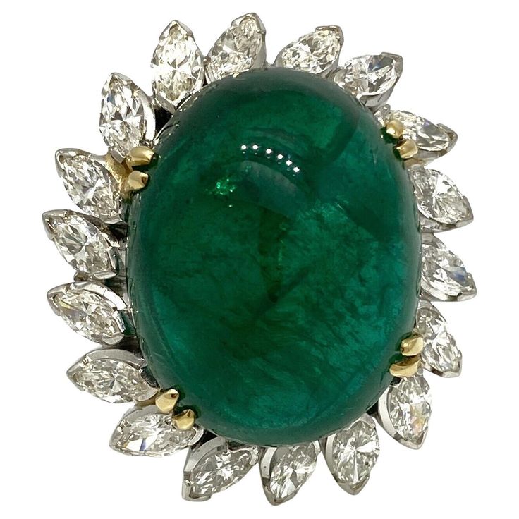 Emerald and Diamond Ring in Platinum featuring an Oval Cabochon Emerald weighing 29.20 carats GIA certified Zambia Origin F2 clarity enhancement Platinum setting with 18 Marquise Diamonds weighing 3.00 carats estimated Ring size is 6.75 Ring top measures 1.00 inch across and 1.15 inches down Ring weighs 20.2 grams Marked Plat Auto Correct, Fantasy Life, Emerald And Diamond Ring, Ring Marquise, Cabochon Ring, Marquise Diamond, Emerald Ring, Oval Cabochon, Automatic Transmission