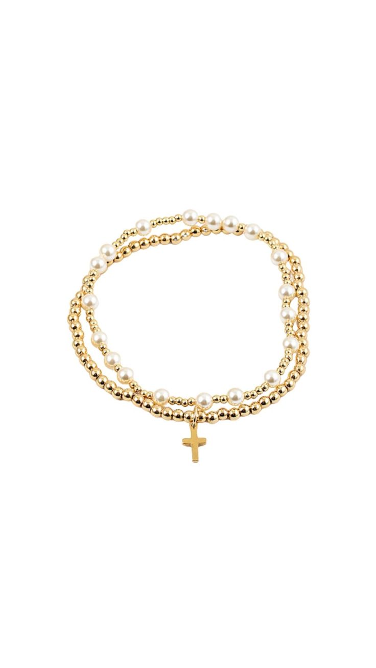 Bead it up this summer with the Pearly Cross Bracelet! With two beaded bracelets in one these beads are perfect for a poolside look! Brass base Two strands of beads Cross charm Gold Beaded Charm Bracelet For Beach, Gold Adjustable Double Strand Beaded Bracelets, Gold Hand-strung Beach Stretch Bracelet, Hand-strung Gold Stretch Bracelet For Beach, Gold Bracelets With 8mm Beads For Beach, Adjustable Double Strand Gold Beads, Gold Stretch Bracelet With Tiny Beads For Beach, Gold Stretch Bracelet With Round Beads For Beach, Gold Hand-strung Beaded Bracelets For Beach